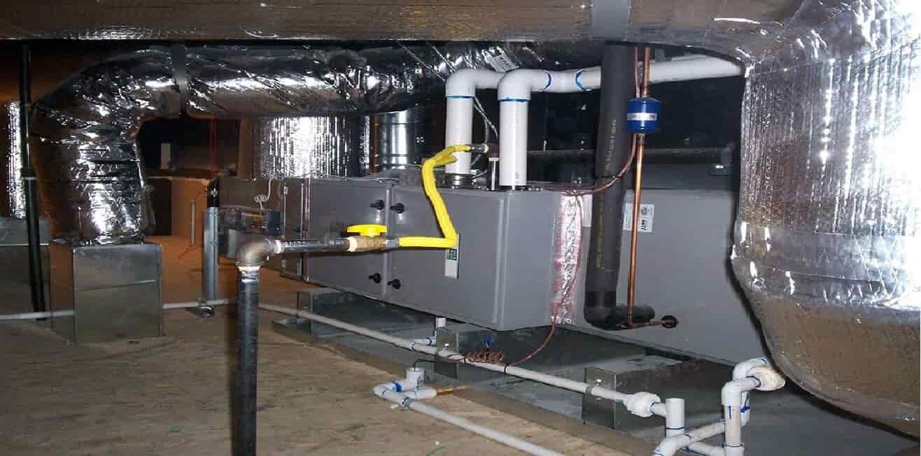 Commercial HVAC system with air ducts and controls for maintenance and AC tune-up